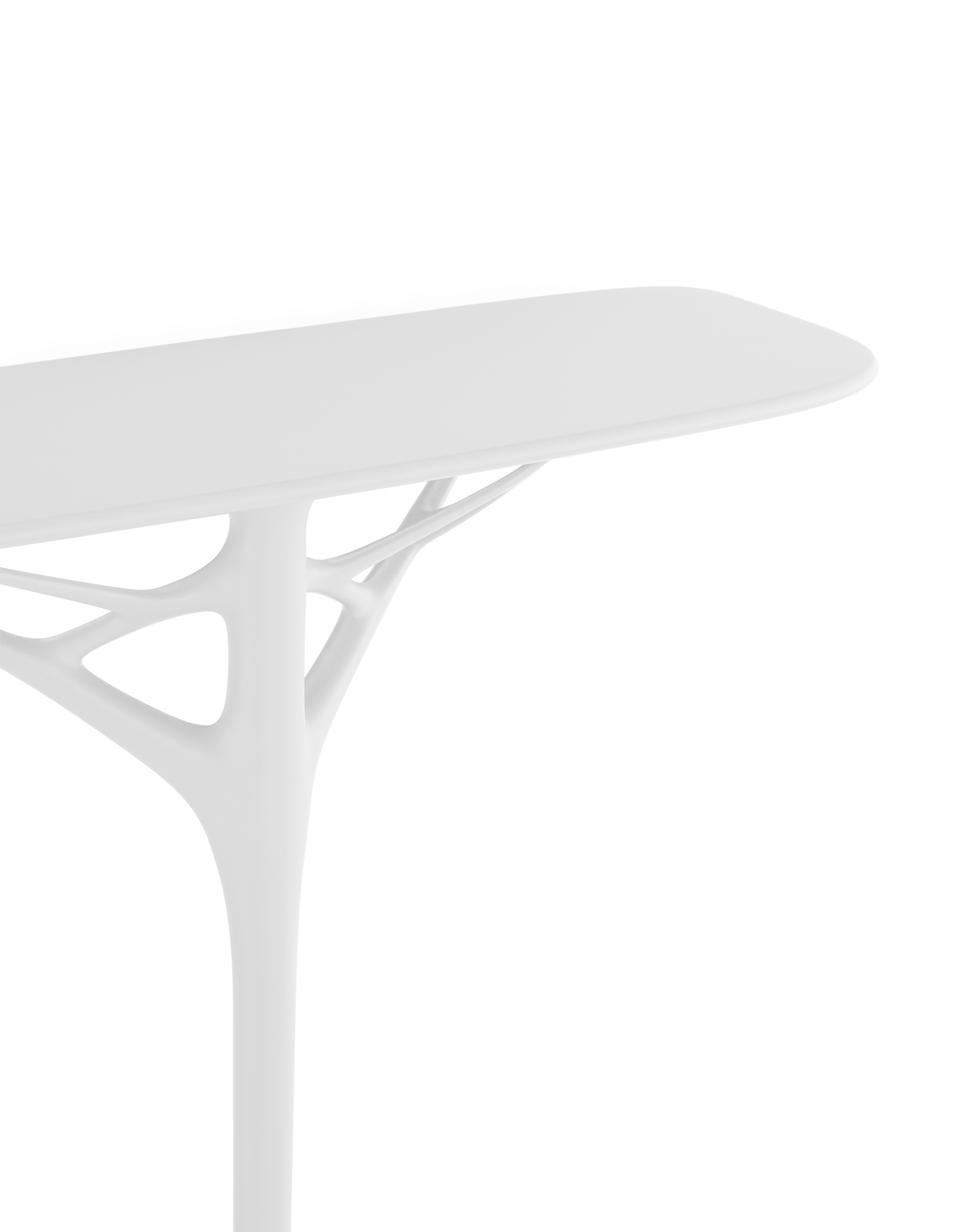 Close-up detail of the white A.I. Console showing the connection between the tabletop and the organic support structure.
